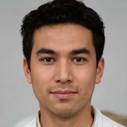Neutral white young-adult male with short  black hair and brown eyes