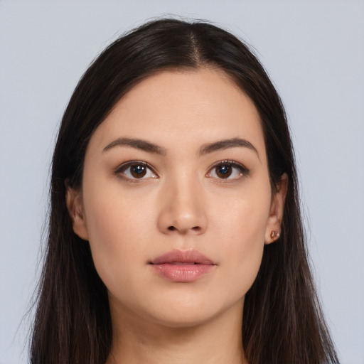 Neutral white young-adult female with long  brown hair and brown eyes