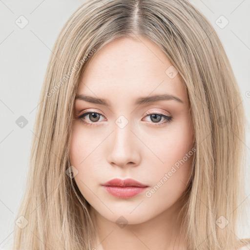 Neutral white young-adult female with long  brown hair and brown eyes