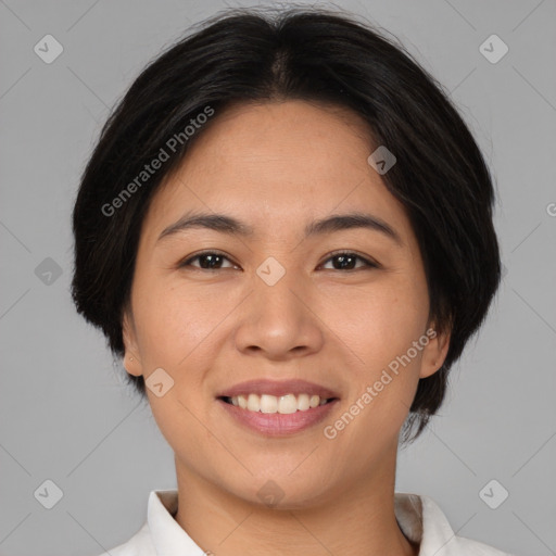 Joyful asian young-adult female with medium  brown hair and brown eyes