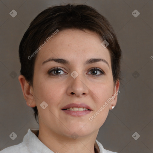 Joyful white young-adult female with short  brown hair and grey eyes