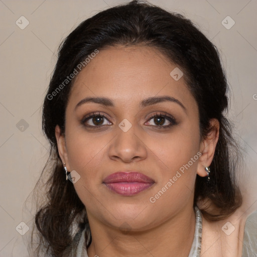 Joyful latino young-adult female with medium  brown hair and brown eyes