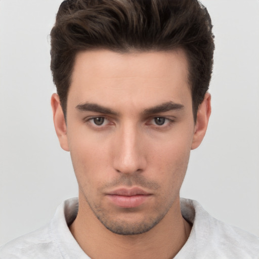 Neutral white young-adult male with short  brown hair and brown eyes