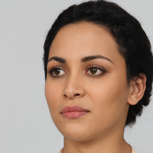 Neutral latino young-adult female with short  black hair and brown eyes