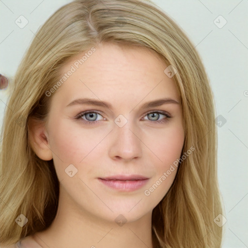 Joyful white young-adult female with long  brown hair and blue eyes