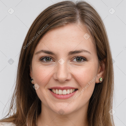 Joyful white young-adult female with long  brown hair and grey eyes