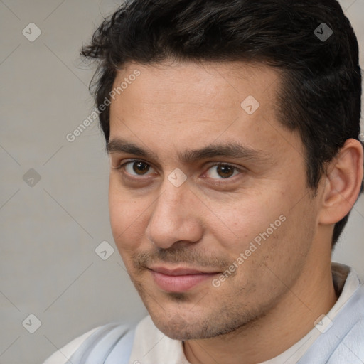 Joyful white adult male with short  brown hair and brown eyes