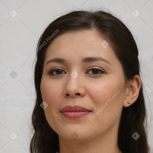 Joyful white young-adult female with long  brown hair and brown eyes