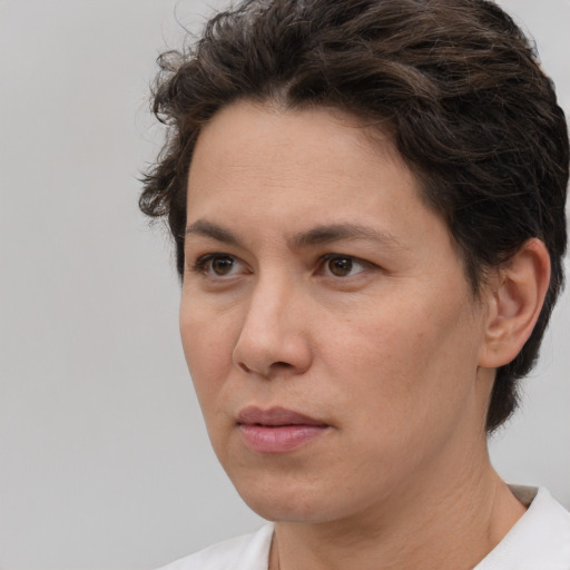 Neutral white adult female with short  brown hair and brown eyes