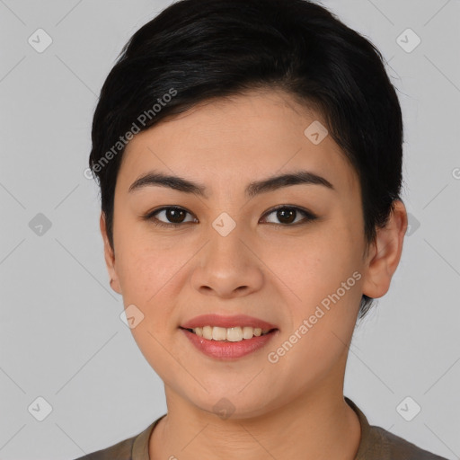 Joyful asian young-adult female with short  brown hair and brown eyes