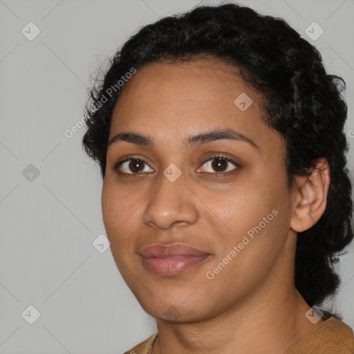 Joyful latino young-adult female with short  black hair and brown eyes