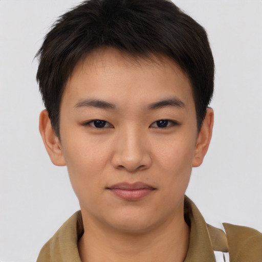 Joyful asian young-adult female with short  brown hair and brown eyes