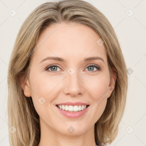 Joyful white young-adult female with long  brown hair and green eyes