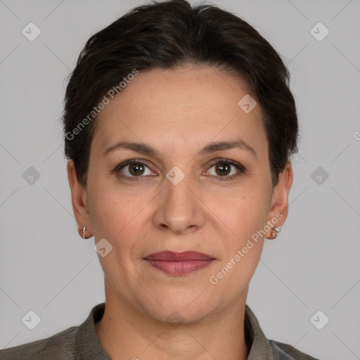 Joyful white adult female with short  brown hair and brown eyes