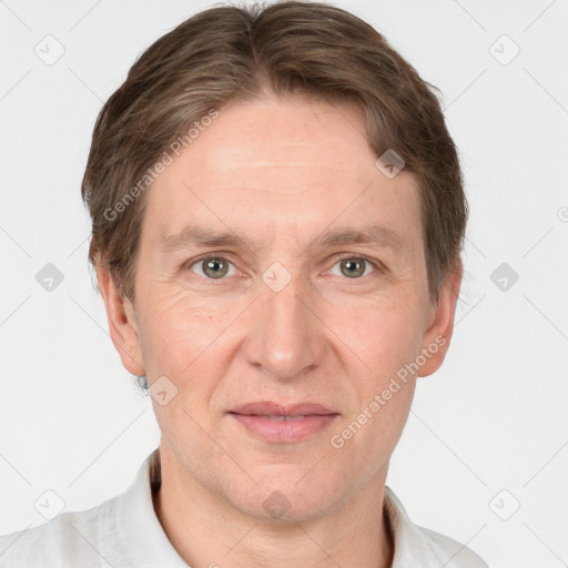 Joyful white adult male with short  brown hair and grey eyes