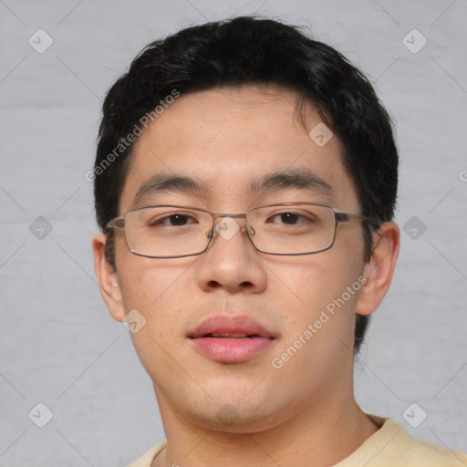 Neutral asian young-adult male with short  black hair and brown eyes