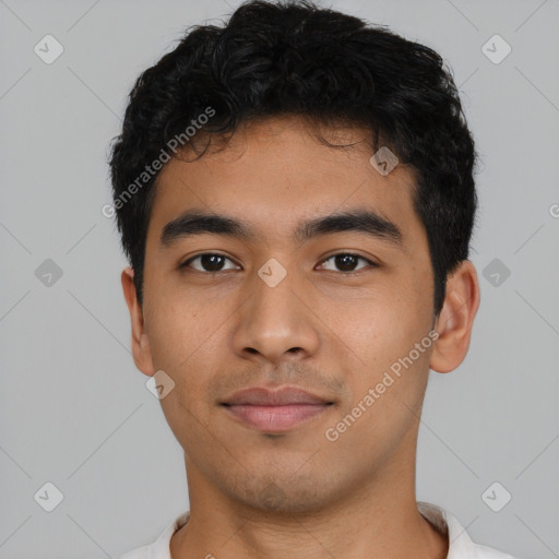 Neutral latino young-adult male with short  black hair and brown eyes