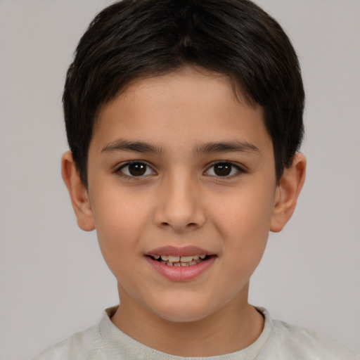 Joyful white child female with short  brown hair and brown eyes