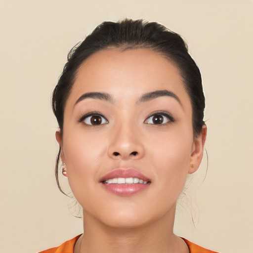 Joyful asian young-adult female with medium  black hair and brown eyes