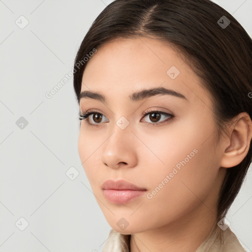 Neutral white young-adult female with long  brown hair and brown eyes