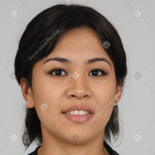 Joyful asian young-adult female with medium  black hair and brown eyes