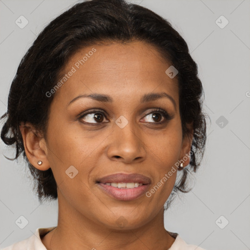 Joyful black young-adult female with medium  brown hair and brown eyes