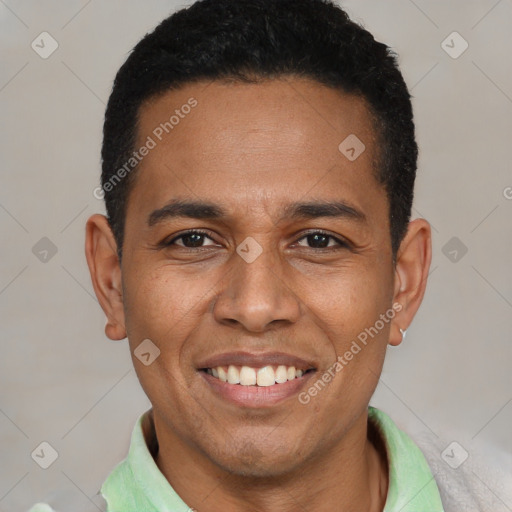 Joyful latino young-adult male with short  black hair and brown eyes