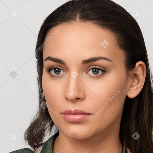 Neutral white young-adult female with long  brown hair and brown eyes