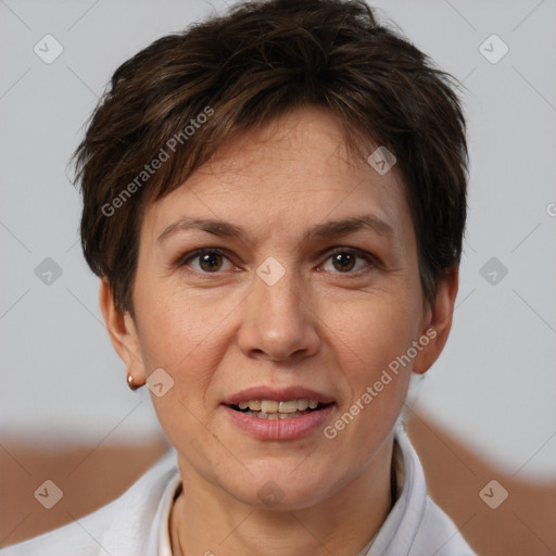 Joyful white adult female with short  brown hair and brown eyes