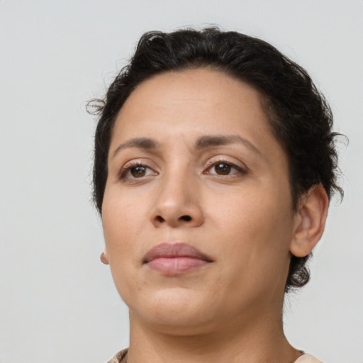 Neutral latino young-adult female with short  brown hair and brown eyes