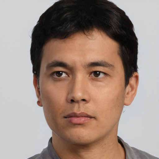 Neutral asian young-adult male with short  black hair and brown eyes