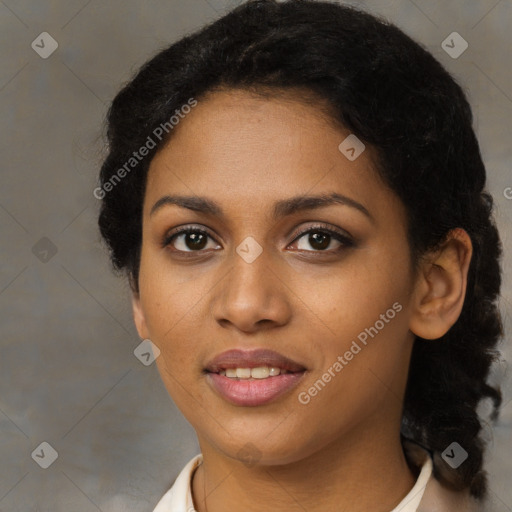 Joyful black young-adult female with medium  black hair and brown eyes