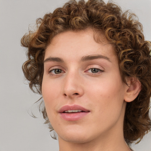 Joyful white young-adult female with medium  brown hair and green eyes