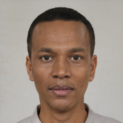 Neutral black young-adult male with short  black hair and brown eyes