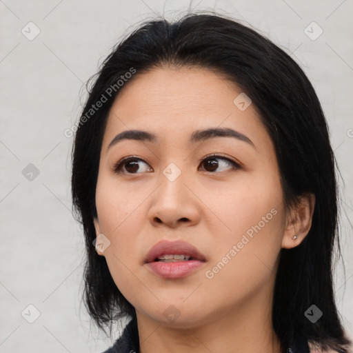 Neutral asian young-adult female with medium  black hair and brown eyes