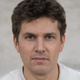 Neutral white adult male with short  brown hair and brown eyes