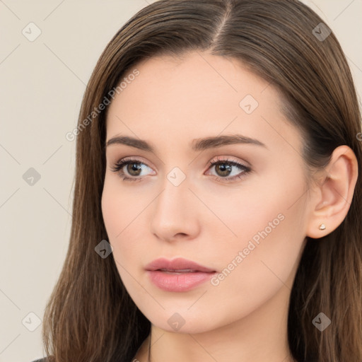 Neutral white young-adult female with long  brown hair and brown eyes