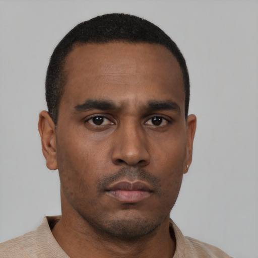 Neutral black young-adult male with short  black hair and brown eyes