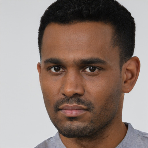 Neutral black young-adult male with short  black hair and brown eyes