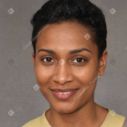 Joyful black young-adult female with short  black hair and brown eyes