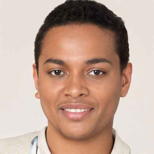 Joyful black young-adult male with short  brown hair and brown eyes