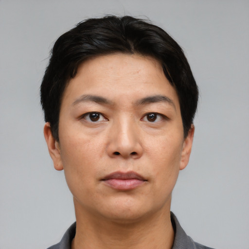 Neutral asian young-adult female with short  black hair and brown eyes