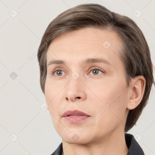 Neutral white adult female with short  brown hair and brown eyes