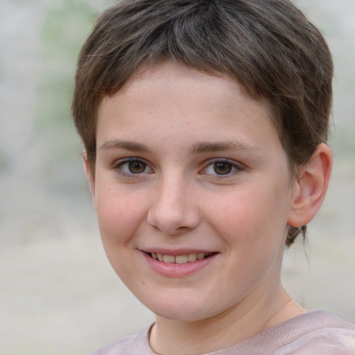 Joyful white child female with short  brown hair and brown eyes