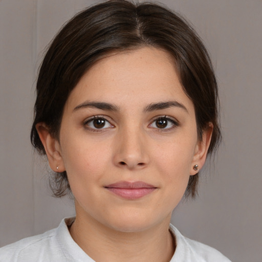 Neutral white young-adult female with medium  brown hair and brown eyes