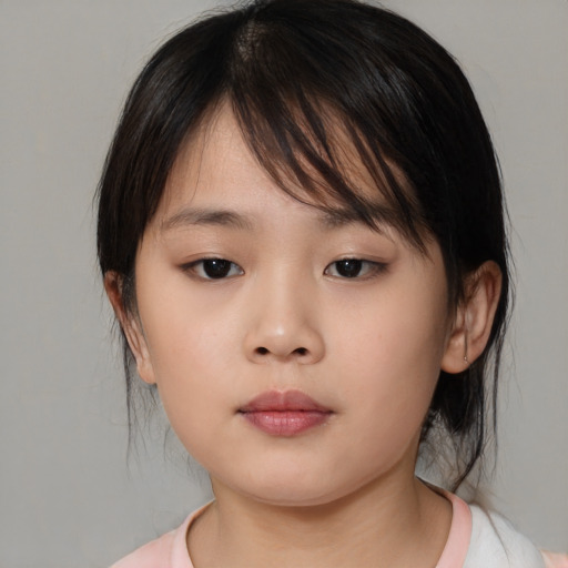 Neutral asian child female with medium  brown hair and brown eyes