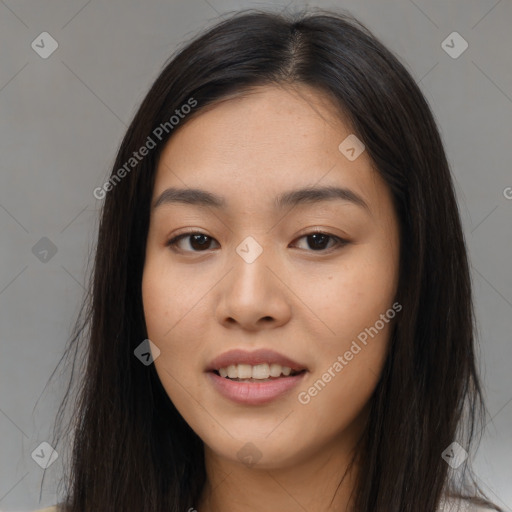 Joyful asian young-adult female with long  brown hair and brown eyes