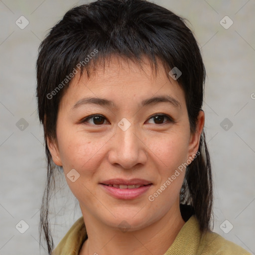 Joyful white adult female with medium  brown hair and brown eyes