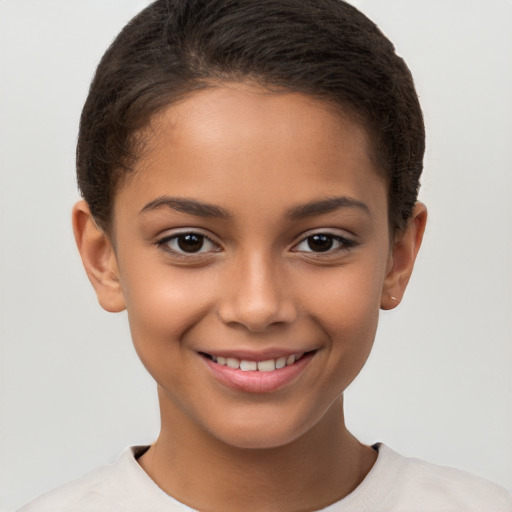 Joyful white child female with short  brown hair and brown eyes