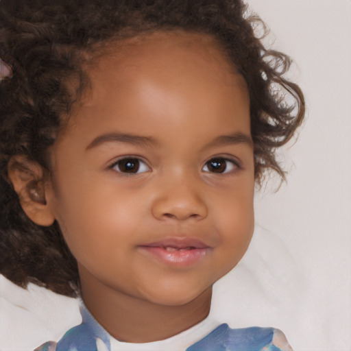 Joyful latino child female with medium  brown hair and brown eyes